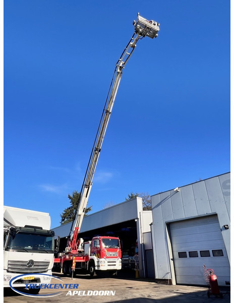 MAN TGA 26.350 Magirus ALP 320L = 32 meter, Waterpomp, 6x4, Bladgeveerd - المطافئ: صور 1 MAN TGA 26.350 Magirus ALP 320L = 32 meter, Waterpomp, 6x4, Bladgeveerd - المطافئ: صور 1