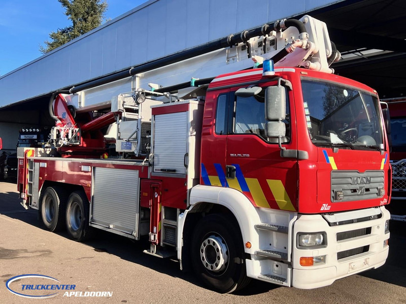 MAN TGA 26.350 Magirus ALP 320L = 32 meter, Waterpomp, 6x4, Bladgeveerd - المطافئ: صور 3 MAN TGA 26.350 Magirus ALP 320L = 32 meter, Waterpomp, 6x4, Bladgeveerd - المطافئ: صور 3
