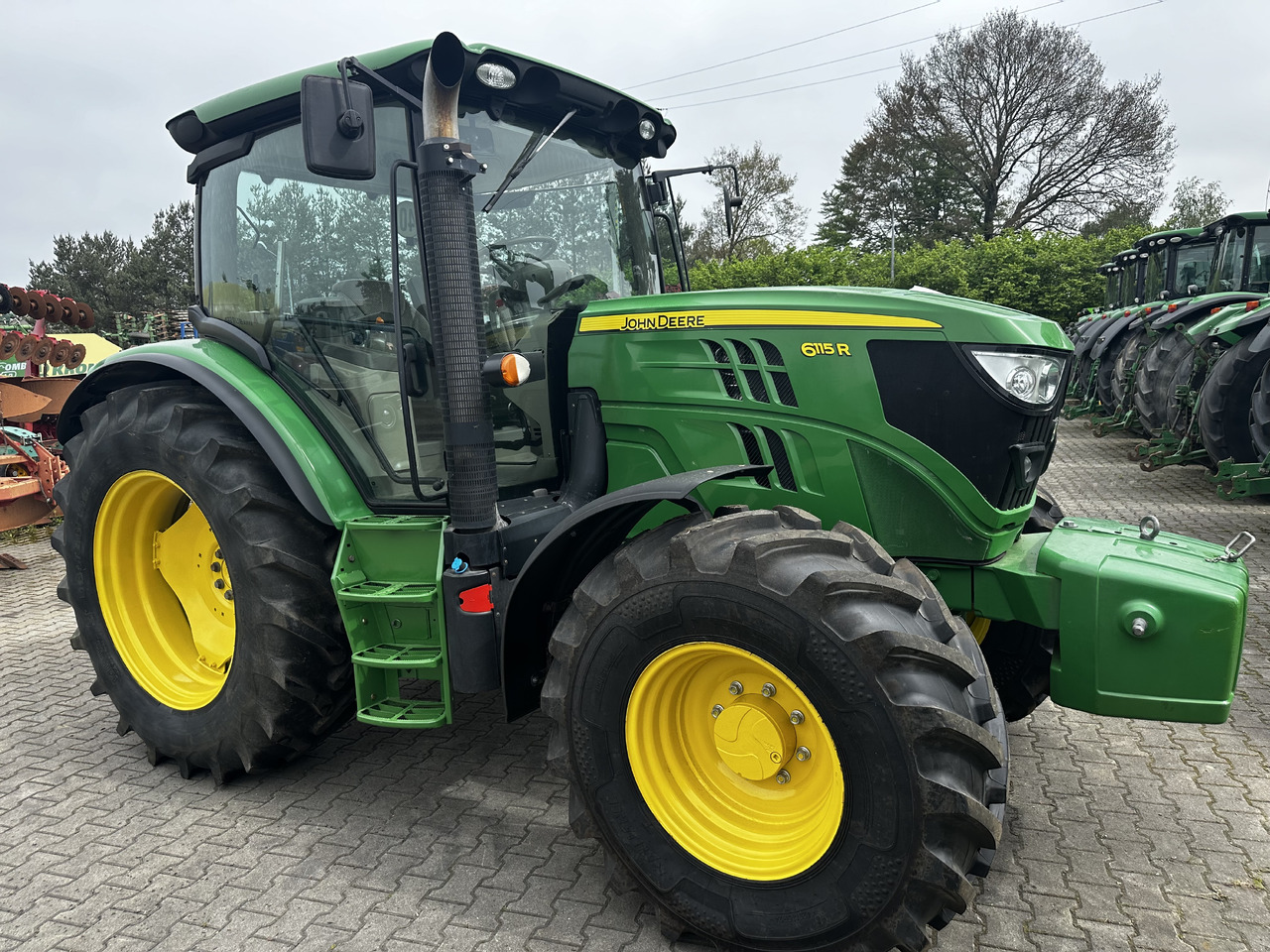 John Deere 6115R - جرار: صور 1 John Deere 6115R - جرار: صور 1