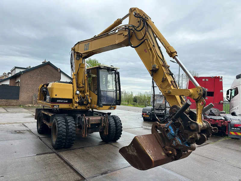 Caterpillar M315 +ROTO CE - حفارة على عجلات: صور 3 Caterpillar M315 +ROTO CE - حفارة على عجلات: صور 3