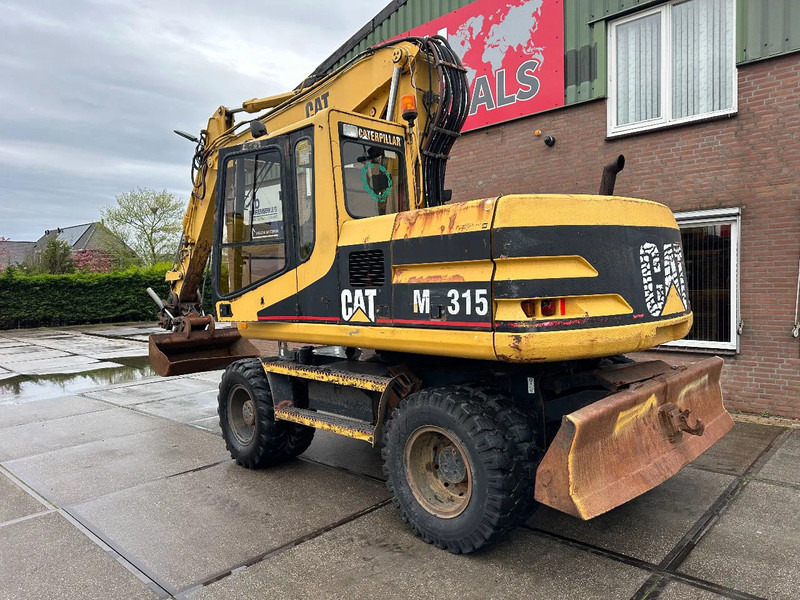 Caterpillar M315 +ROTO CE - حفارة على عجلات: صور 4 Caterpillar M315 +ROTO CE - حفارة على عجلات: صور 4