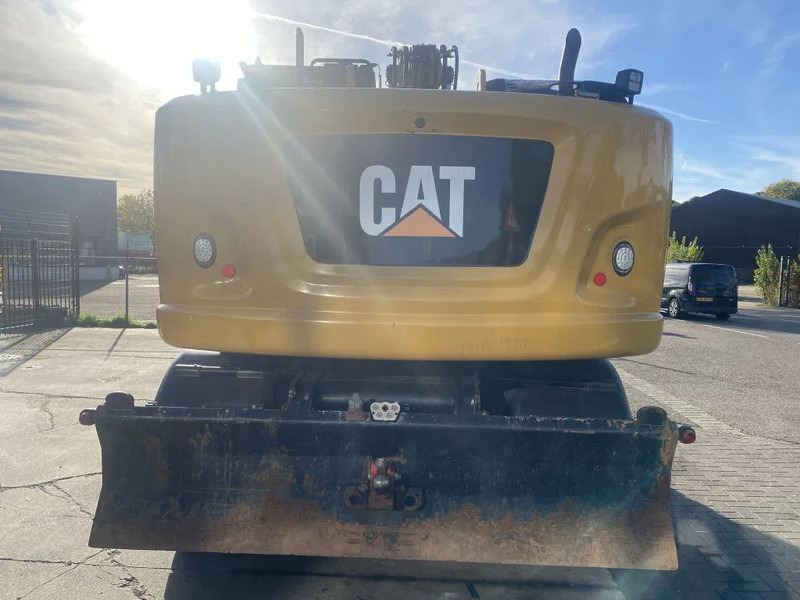 Caterpillar M318F - حفارة على عجلات: صور 5 Caterpillar M318F - حفارة على عجلات: صور 5