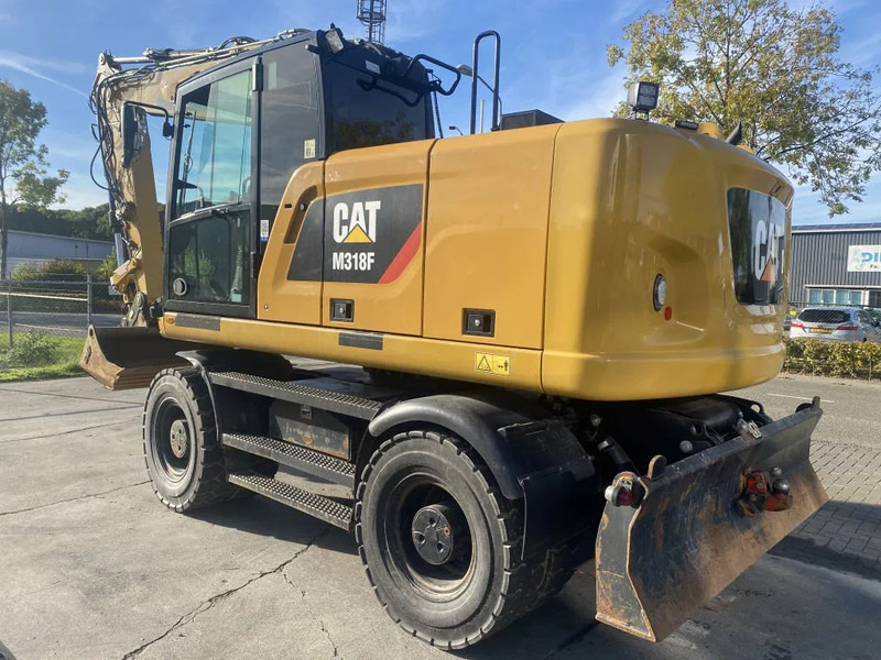 Caterpillar M318F - حفارة على عجلات: صور 4 Caterpillar M318F - حفارة على عجلات: صور 4
