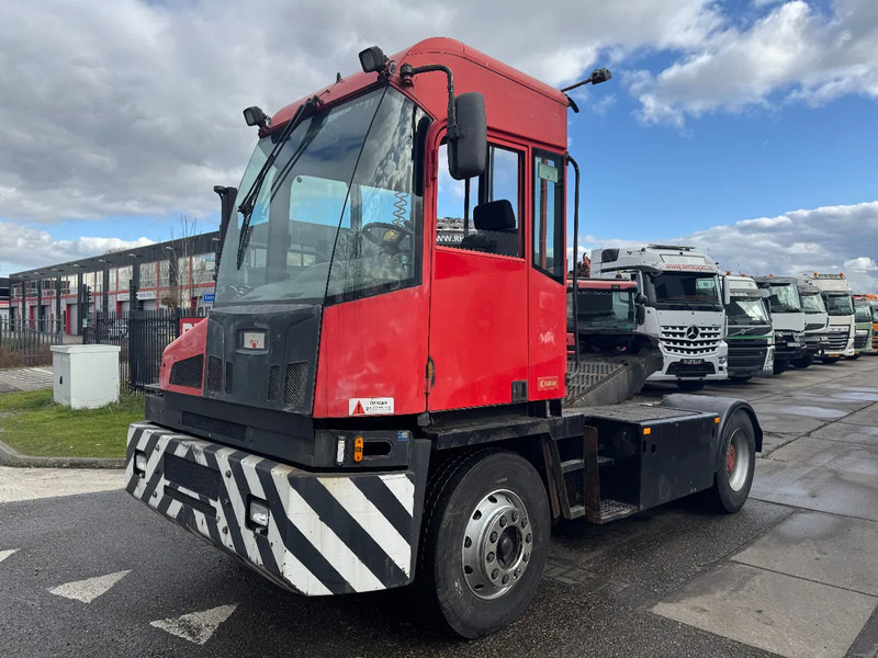 Kalmar TT612D 4X2 - جرارات صالات المطارات: صور 1 Kalmar TT612D 4X2 - جرارات صالات المطارات: صور 1