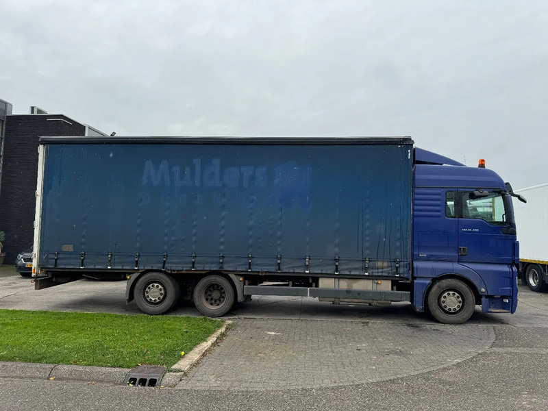 MAN TGX 26.400 6X2 - EURO 4 + LIFT + STEERING AXLE + TÜV 10-2025 - شاحنة ستارة: صور 4 MAN TGX 26.400 6X2 - EURO 4 + LIFT + STEERING AXLE + TÜV 10-2025 - شاحنة ستارة: صور 4