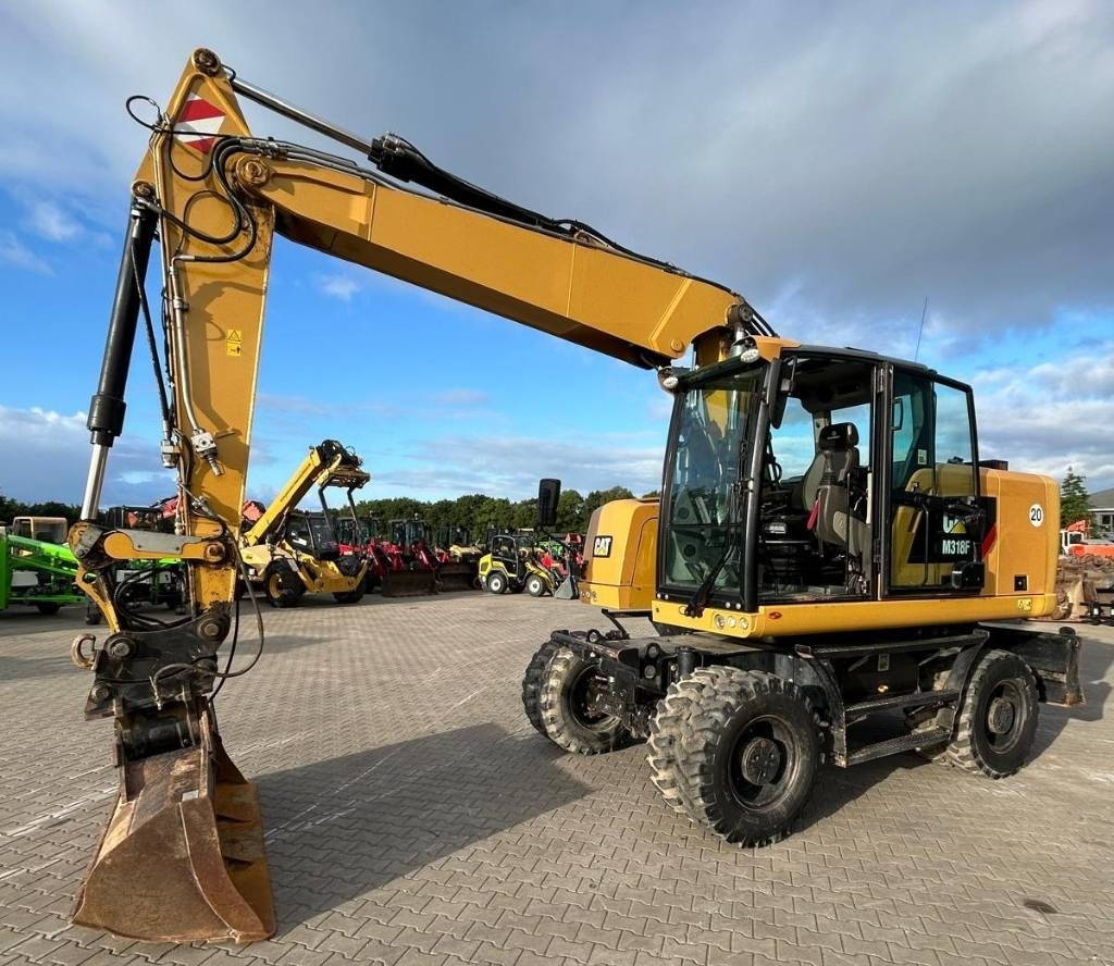 CAT M 318 F - حفارة على عجلات: صور 1 CAT M 318 F - حفارة على عجلات: صور 1