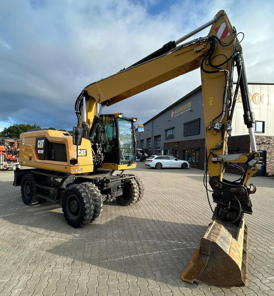 CAT M 318 F - حفارة على عجلات: صور 2 CAT M 318 F - حفارة على عجلات: صور 2