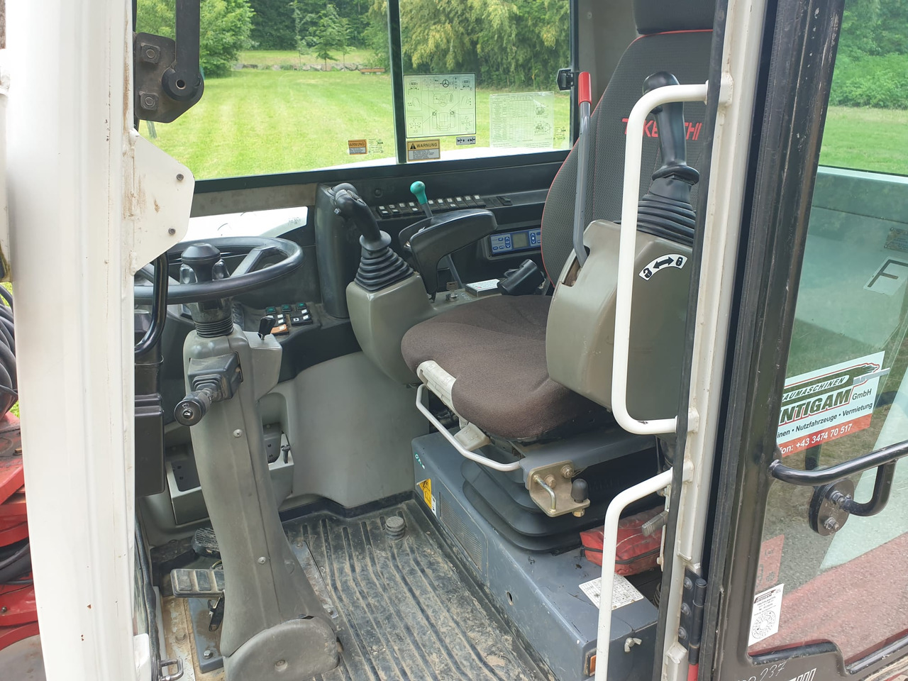 حفارة على عجلات TAKEUCHI TB 295W: صور 12