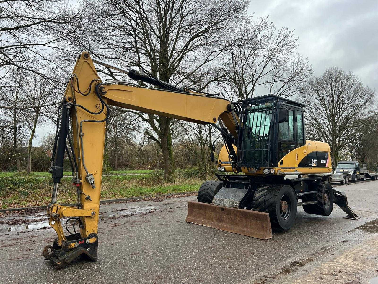 Caterpillar M316D - حفارة على عجلات: صور 1 Caterpillar M316D - حفارة على عجلات: صور 1