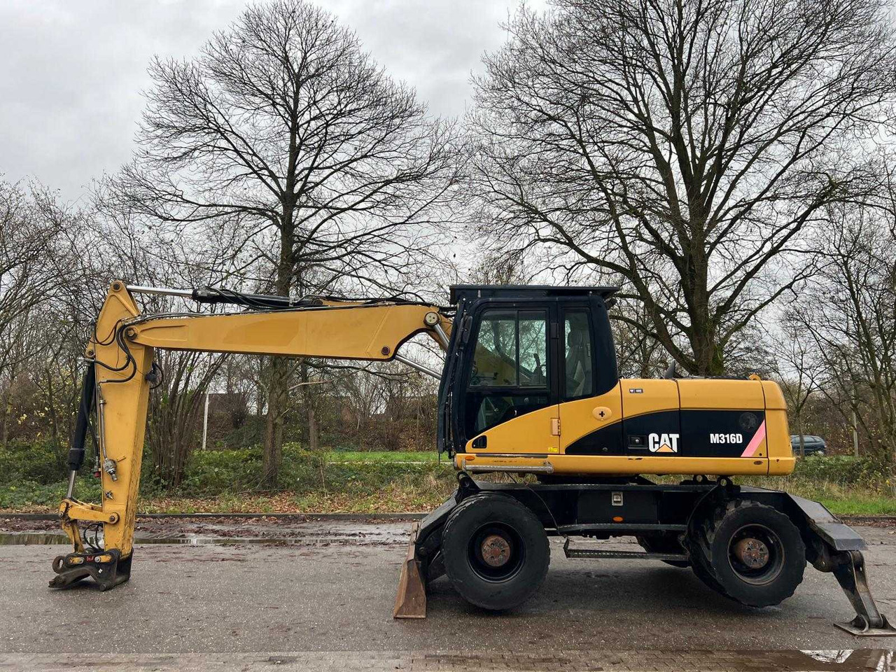 Caterpillar M316D - حفارة على عجلات: صور 2 Caterpillar M316D - حفارة على عجلات: صور 2