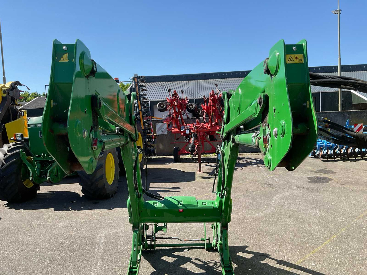 John Deere 663R - لوادر وحفارات أمامية: صور 4 John Deere 663R - لوادر وحفارات أمامية: صور 4
