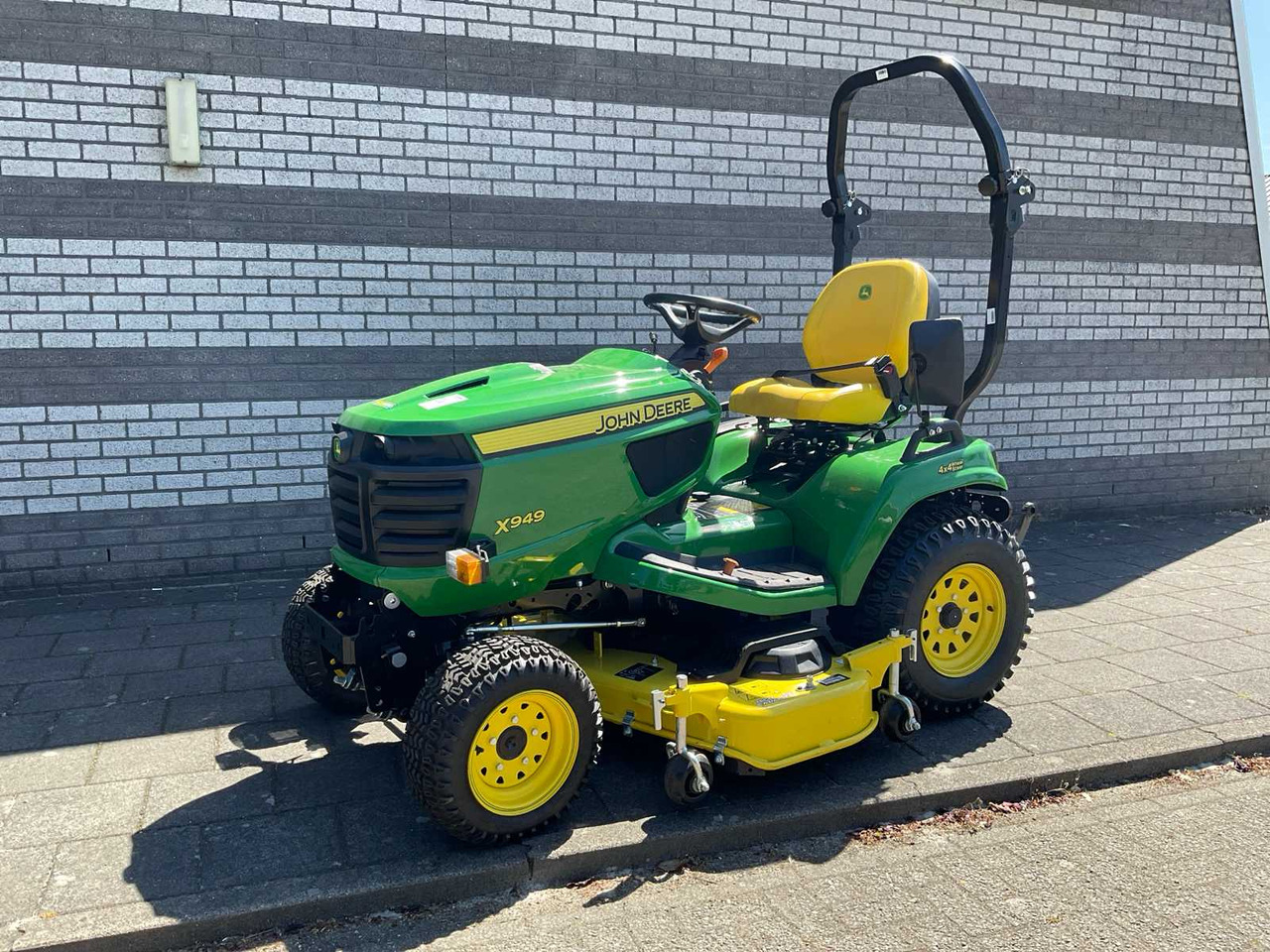 John Deere X949 4x4 Wheel Steer - جزازة المروج: صور 1 John Deere X949 4x4 Wheel Steer - جزازة المروج: صور 1