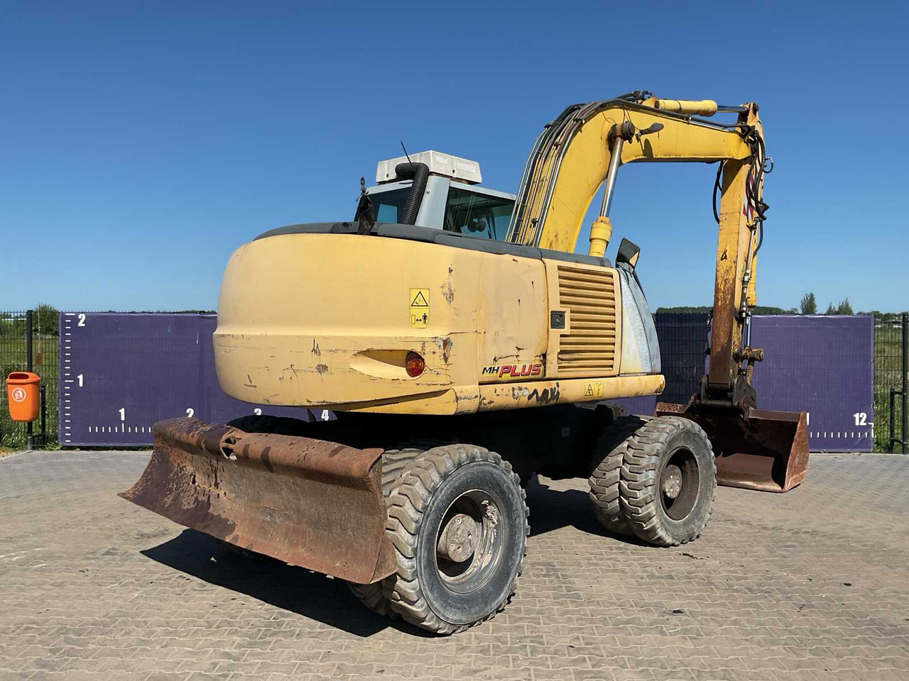 New holland MH plus - حفارة على عجلات: صور 3 New holland MH plus - حفارة على عجلات: صور 3