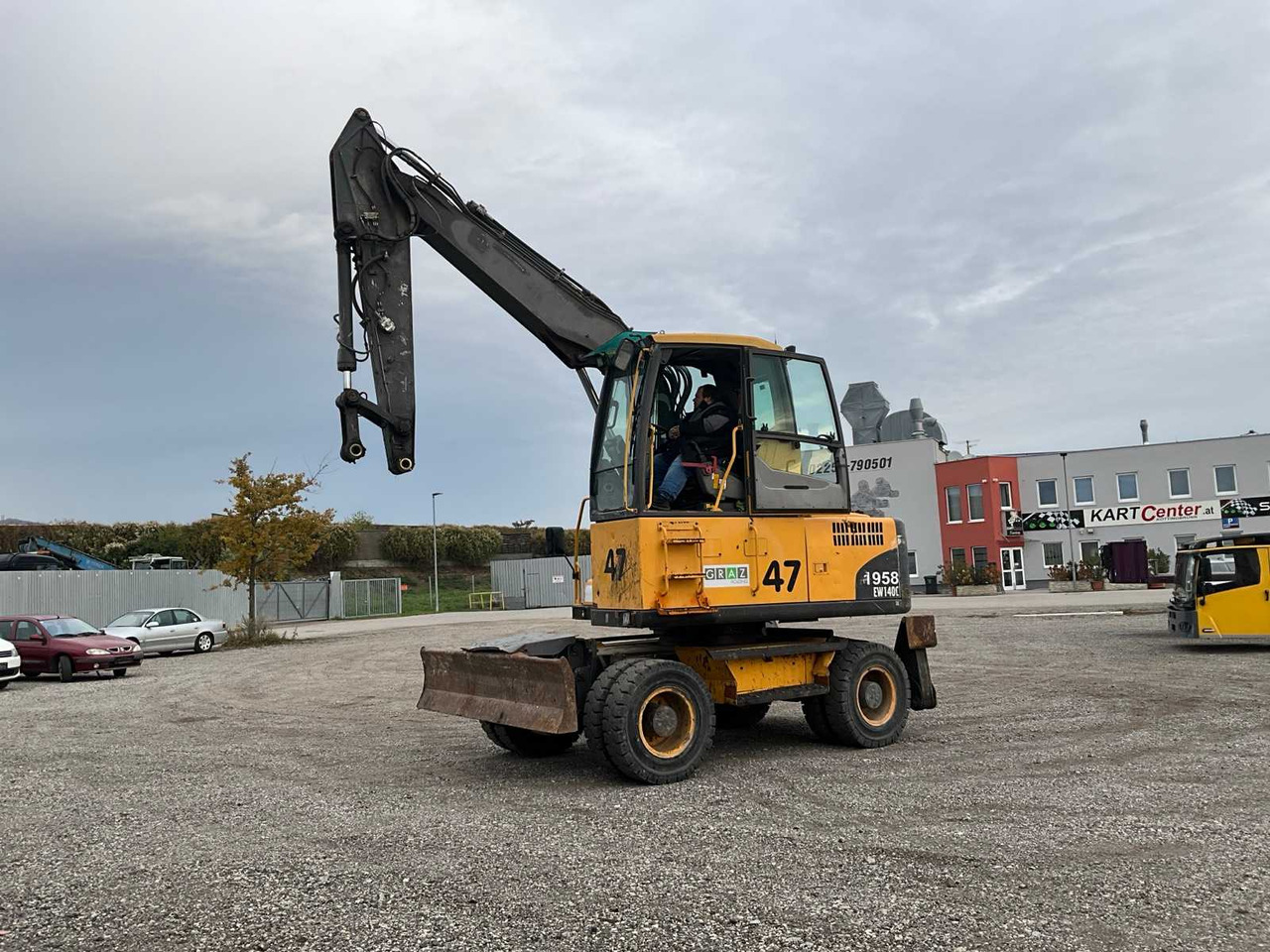 Volvo EW140C - حفارة على عجلات: صور 1 Volvo EW140C - حفارة على عجلات: صور 1
