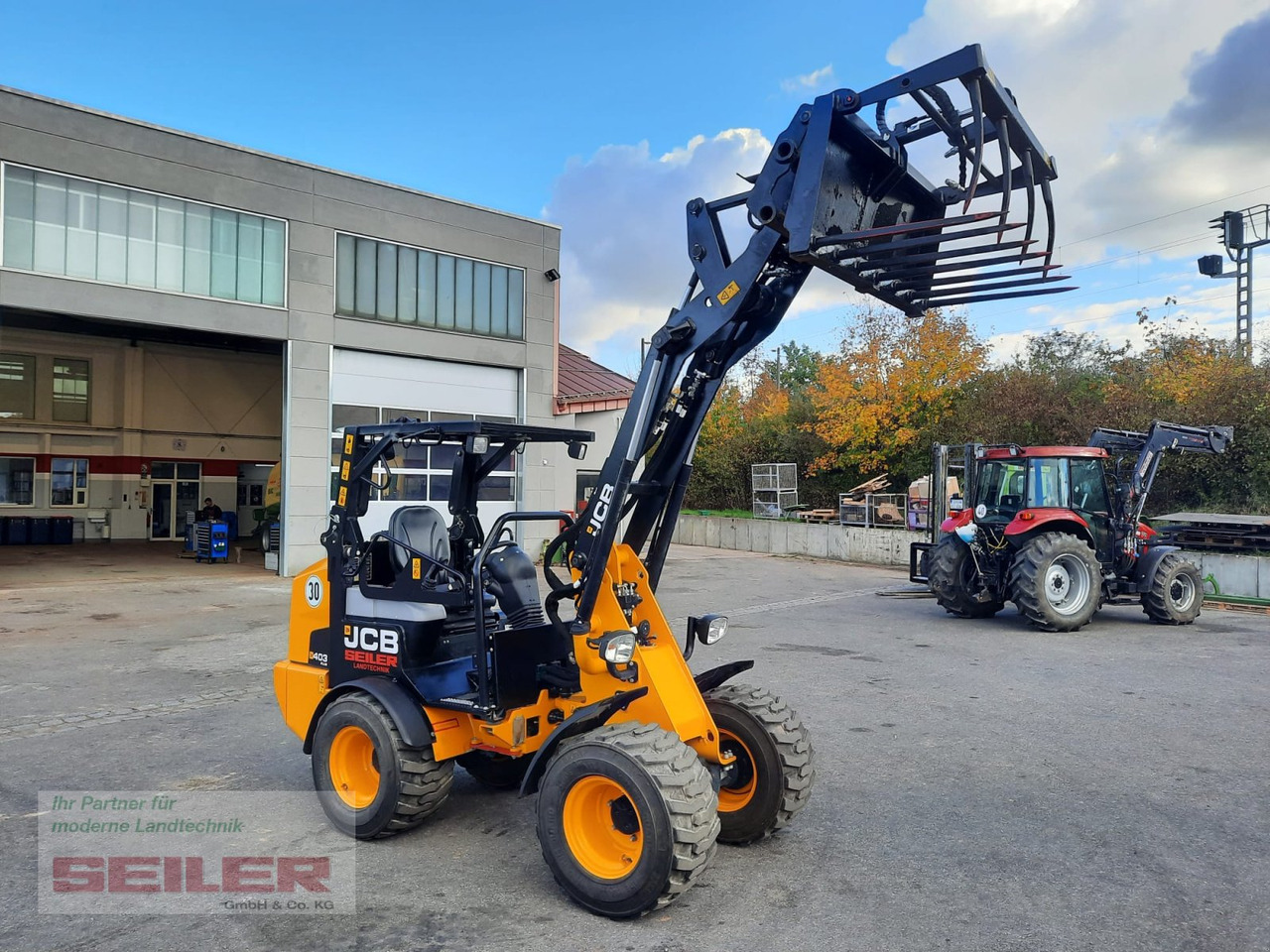 JCB 403 Agri PLUS - لودر مفصلي صغير: صور 1 JCB 403 Agri PLUS - لودر مفصلي صغير: صور 1