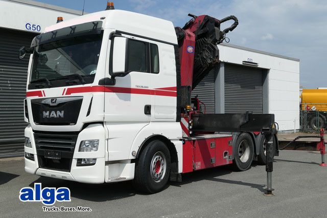 MAN 28.500 TGX 6X2-2 BLS, Kran HMF 5020-K6, Funk,23m - شاحنة جرار: صور 1 MAN 28.500 TGX 6X2-2 BLS, Kran HMF 5020-K6, Funk,23m - شاحنة جرار: صور 1