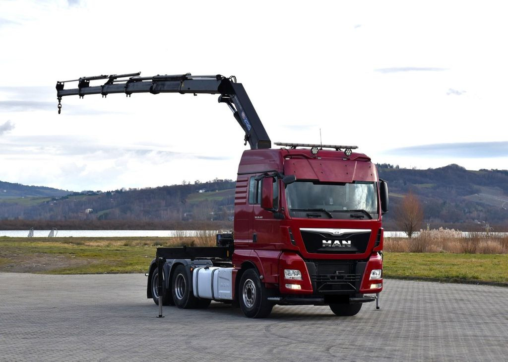 MAN TGX 28.480 Sattelzugmaschine + HMF 2120 K5/FUNK - شاحنة كرين: صور 2 MAN TGX 28.480 Sattelzugmaschine + HMF 2120 K5/FUNK - شاحنة كرين: صور 2