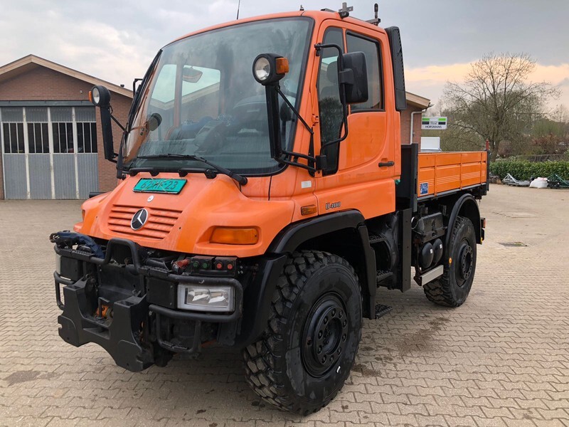 Mercedes-Benz Unimog U400 - شاحنات مسطحة, سيارة بلدية: صور 1 Mercedes-Benz Unimog U400 - شاحنات مسطحة, سيارة بلدية: صور 1