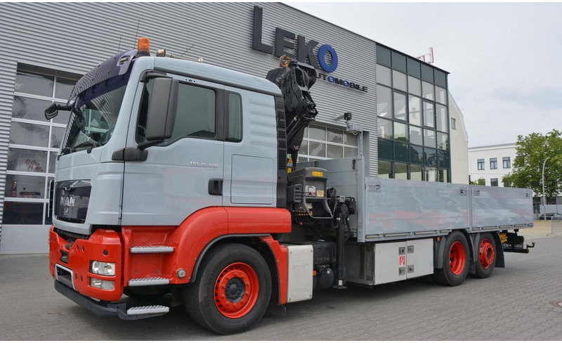 MAN 6,4 m Flatbed + Crane HIAB 211EP 6X2 KRAN HIAB 211EP 6.5m Container Pr - شاحنات مسطحة, شاحنة كرين: صور 1 MAN 6,4 m Flatbed + Crane HIAB 211EP 6X2 KRAN HIAB 211EP 6.5m Container Pr - شاحنات مسطحة, شاحنة كرين: صور 1