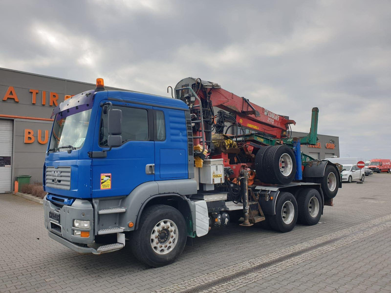 MAN TGA 26.480 6x4 LOGLIFT DOLL WOOD TRANSPORTER - شاحنة قطع الأشجار, شاحنة كرين: صور 1 MAN TGA 26.480 6x4 LOGLIFT DOLL WOOD TRANSPORTER - شاحنة قطع الأشجار, شاحنة كرين: صور 1