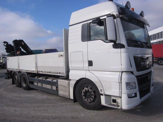 MAN TGX 26.440 mit Hiab-Kran Funkfernbedienung - شاحنات مسطحة, شاحنة كرين: صور 1 MAN TGX 26.440 mit Hiab-Kran Funkfernbedienung - شاحنات مسطحة, شاحنة كرين: صور 1