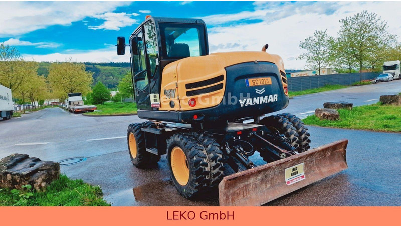 Yanmar B 95W Mit Drei Löffeln und Ein Hammer - حفارة على عجلات: صور 5 Yanmar B 95W Mit Drei Löffeln und Ein Hammer - حفارة على عجلات: صور 5