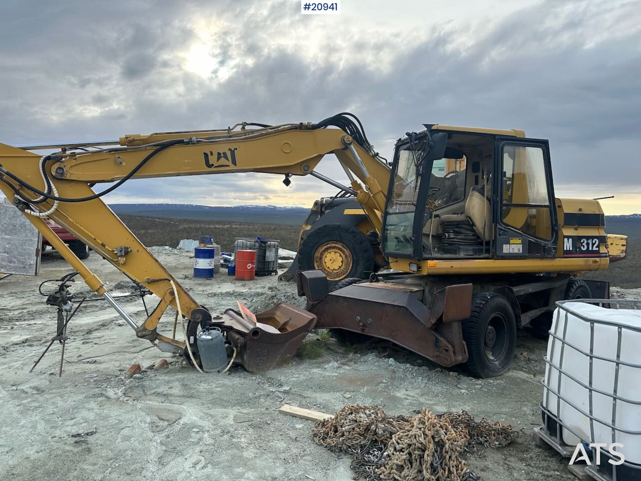 Caterpillar 312 - حفارة على عجلات: صور 2 Caterpillar 312 - حفارة على عجلات: صور 2