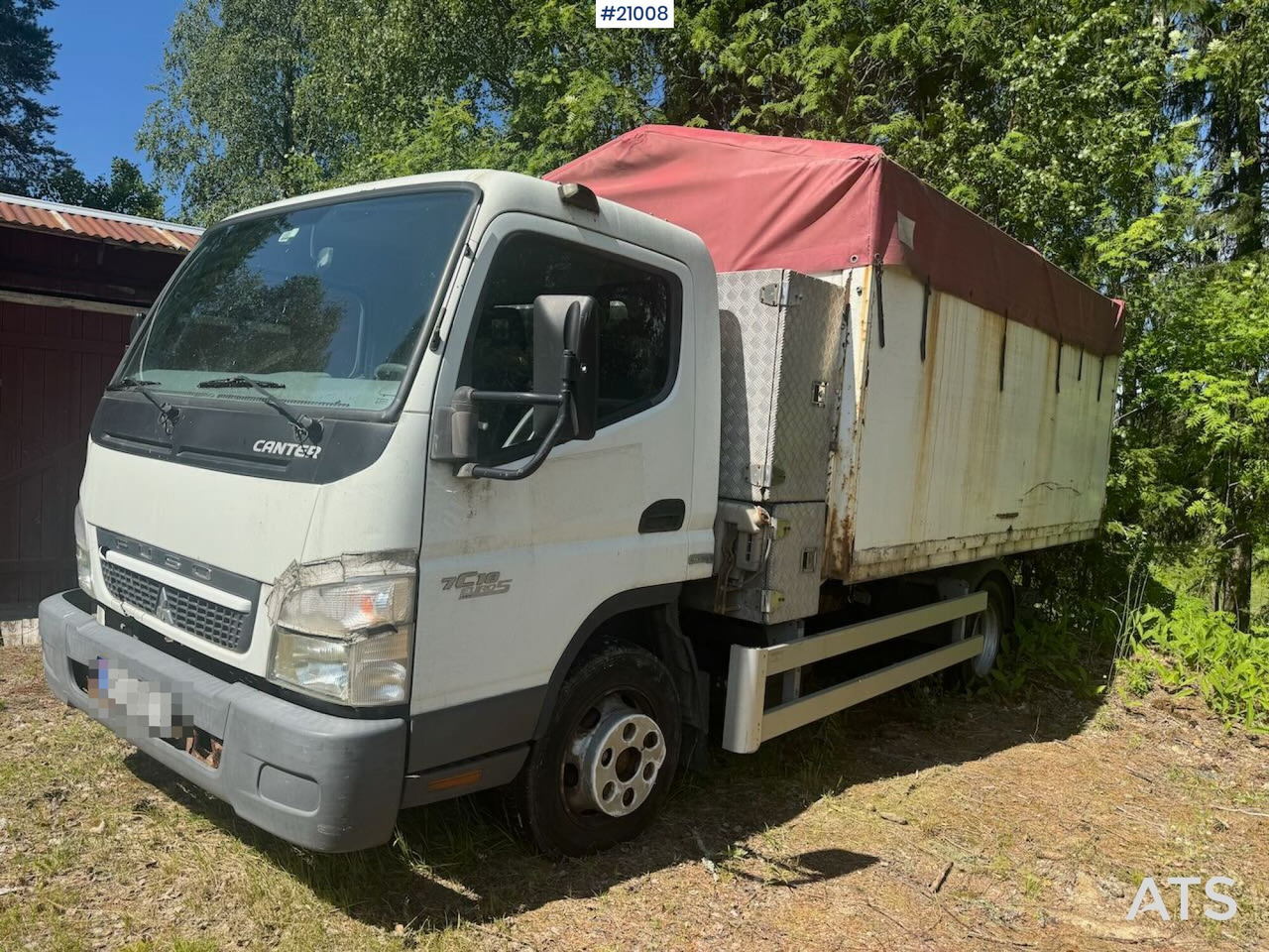 Mitsubishi Fuso Canter - شاحنات مسطحة: صور 1 Mitsubishi Fuso Canter - شاحنات مسطحة: صور 1