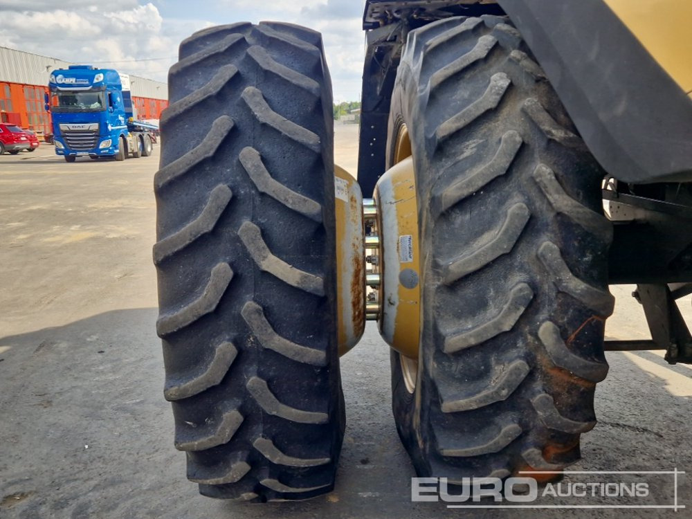 حصادة شاملة CAT LEXION 570R: صور 13