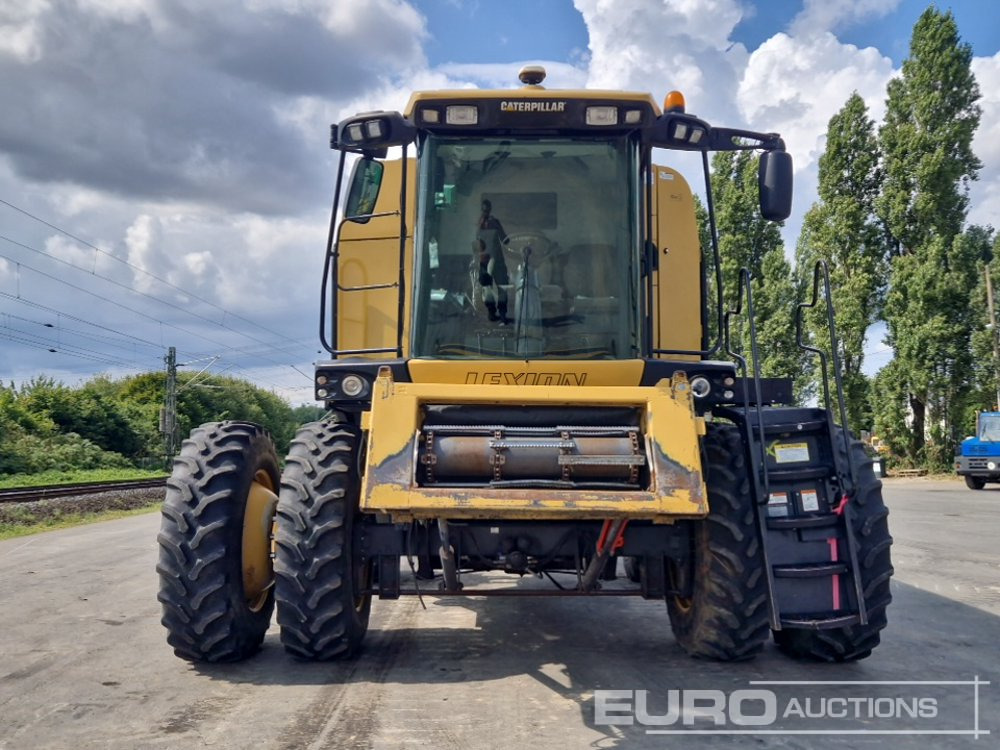 حصادة شاملة CAT LEXION 570R: صور 7