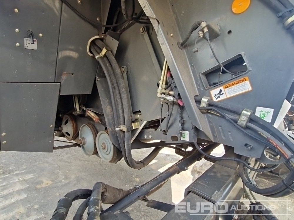 حصادة شاملة CAT LEXION 570R: صور 29