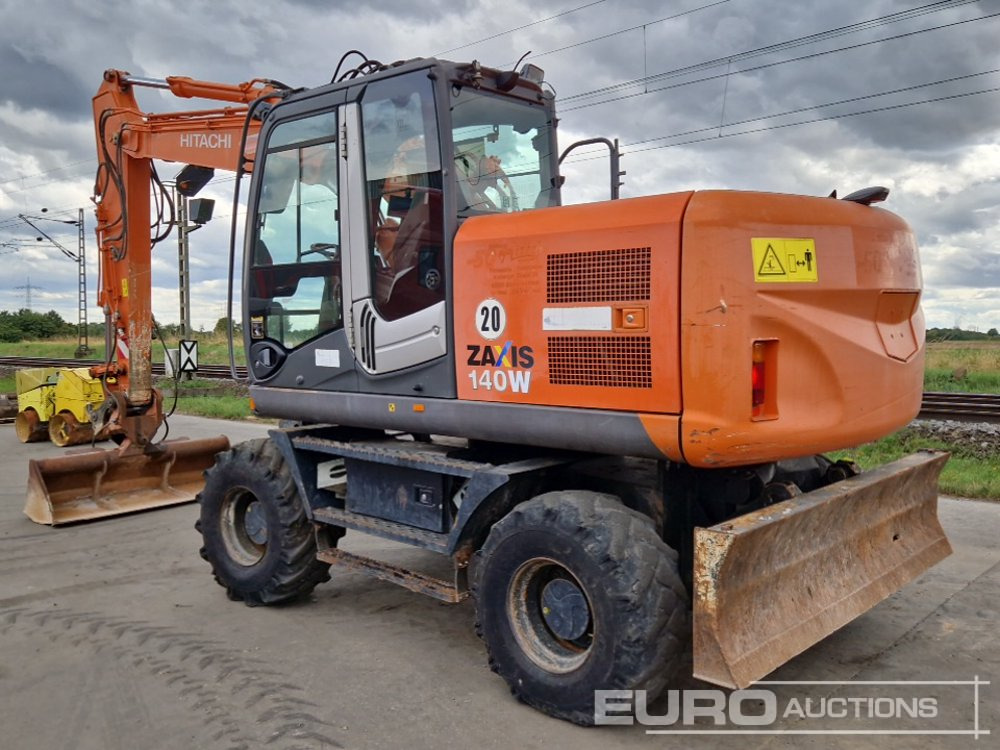 Hitachi ZX140W-3 - حفارة على عجلات: صور 3 Hitachi ZX140W-3 - حفارة على عجلات: صور 3