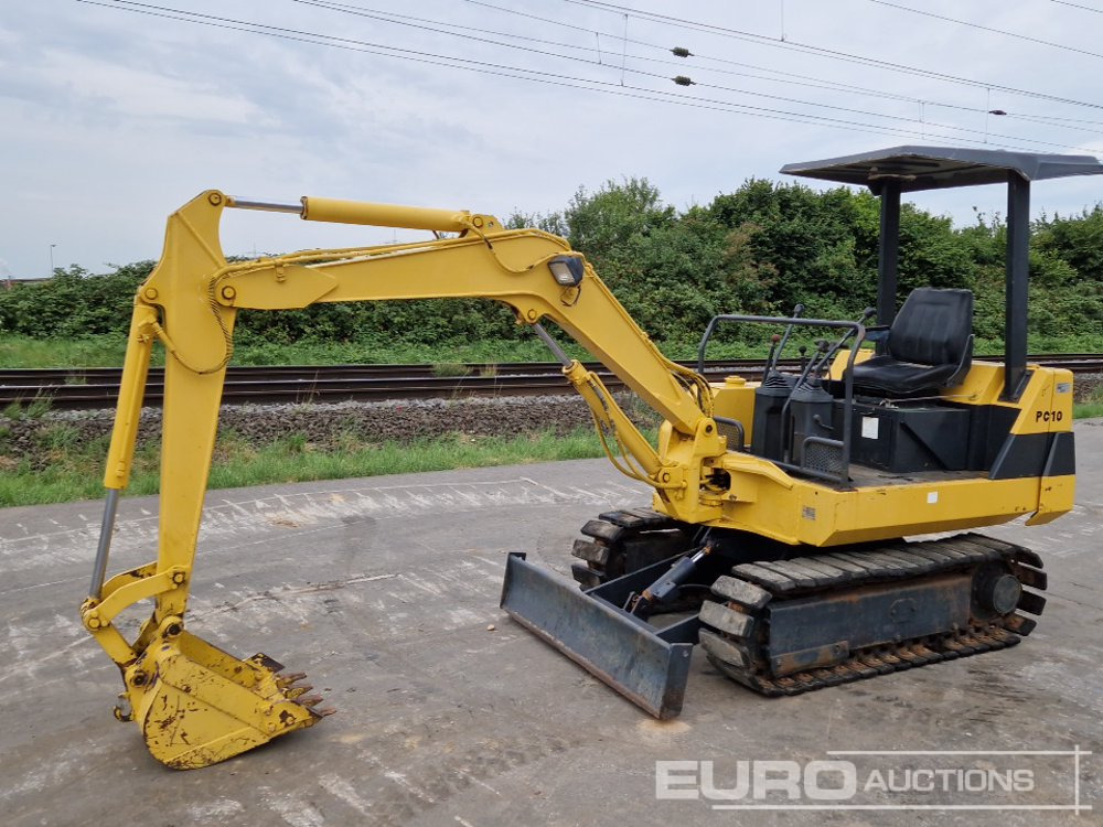 Komatsu PC10-6 - حفارة مصغرة: صور 1 Komatsu PC10-6 - حفارة مصغرة: صور 1
