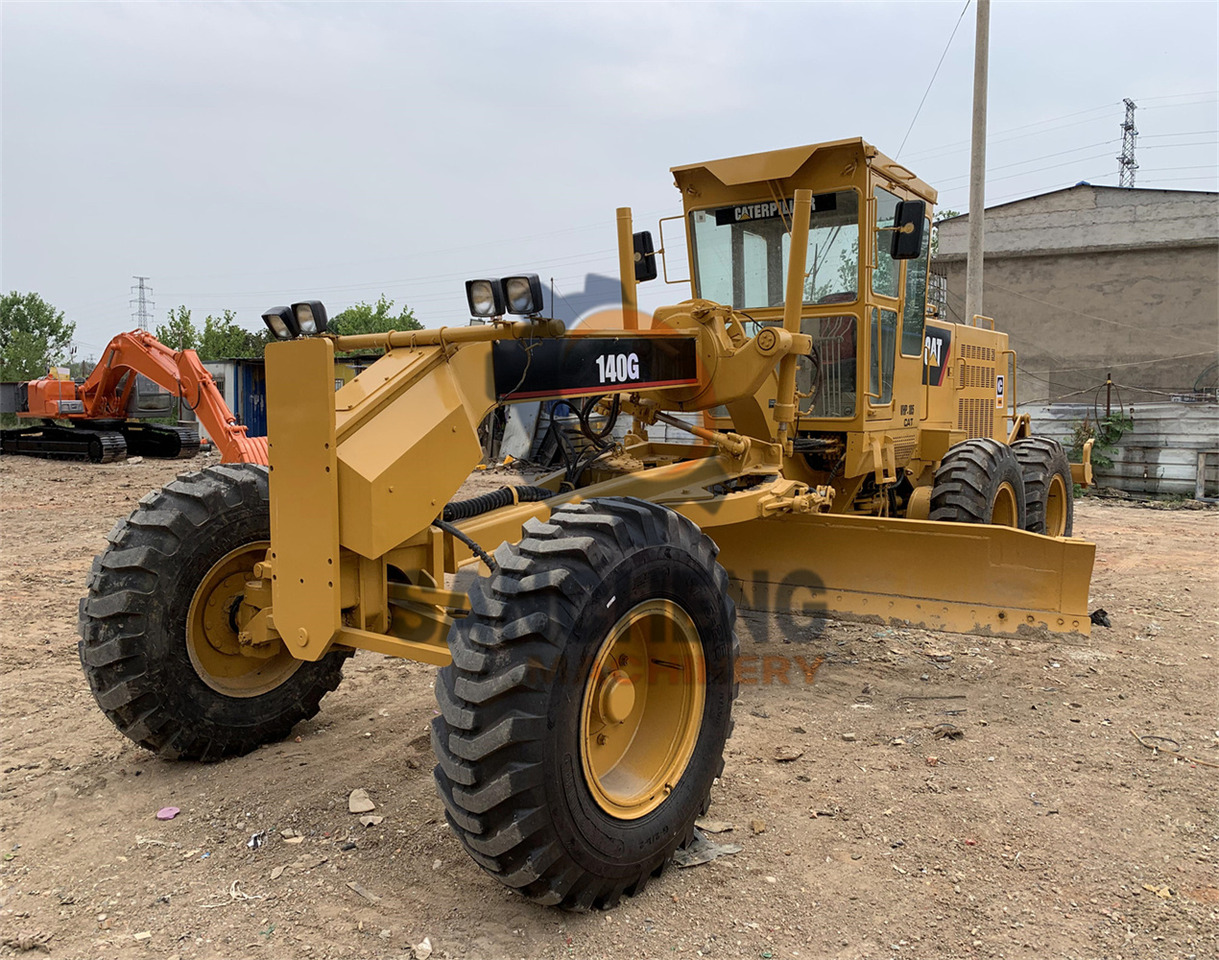 CATERPILLAR 140G - آلة تسوية الأرض: صور 1 CATERPILLAR 140G - آلة تسوية الأرض: صور 1