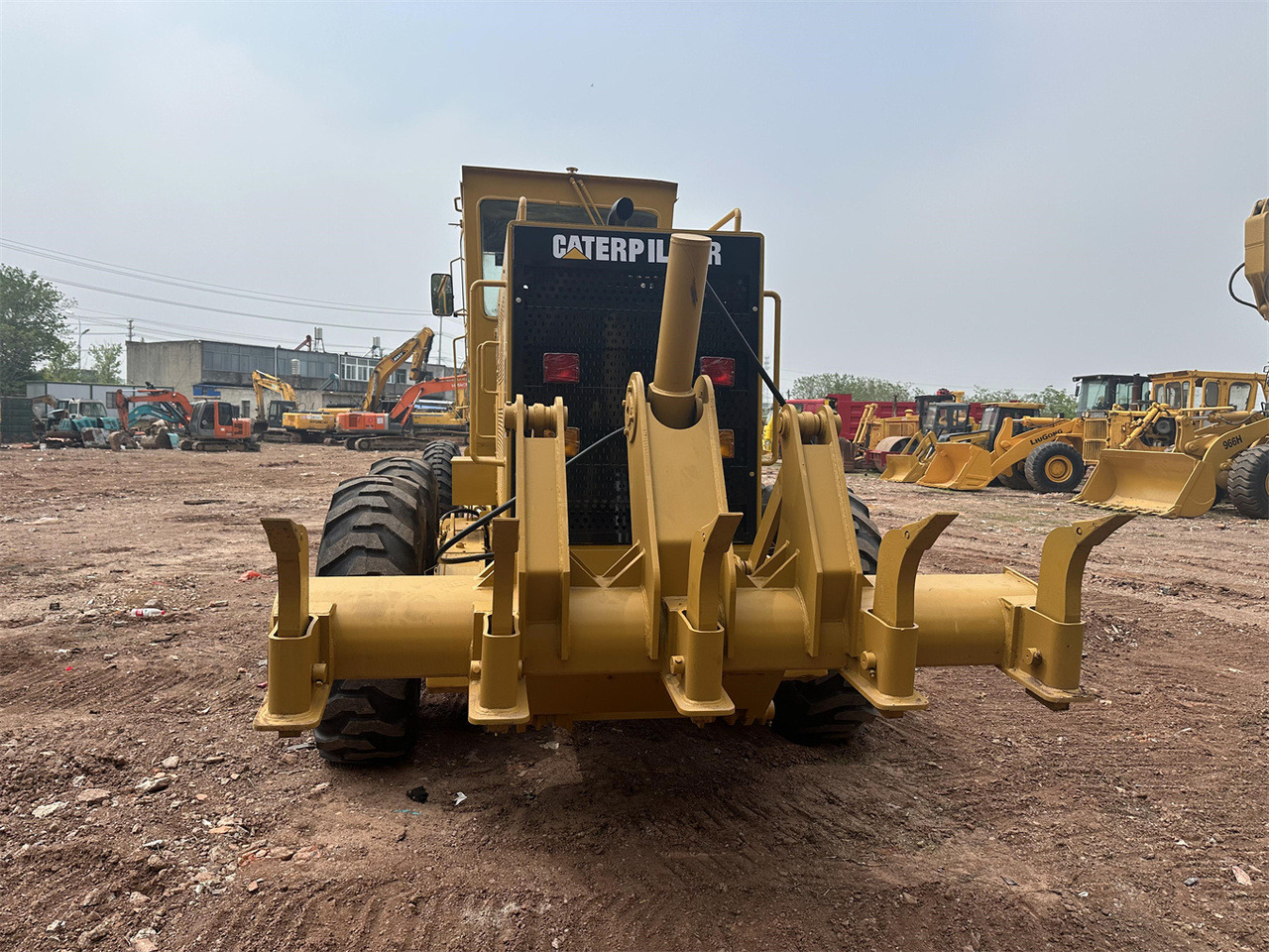 آلة تسوية الأرض CATERPILLAR 140G: صور 7