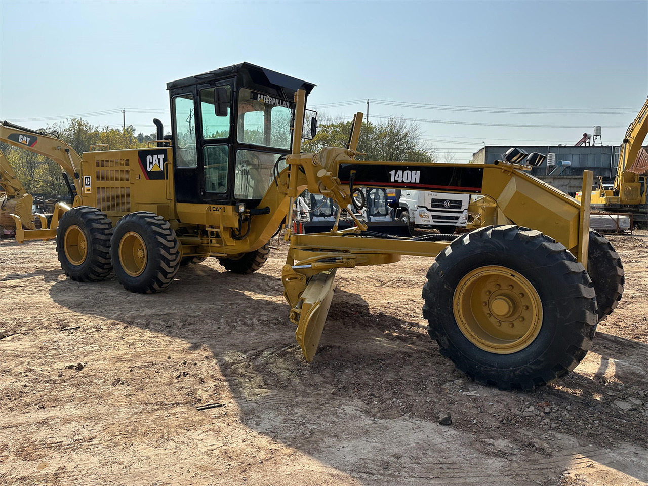 CATERPILLAR 140H - آلة تسوية الأرض: صور 1 CATERPILLAR 140H - آلة تسوية الأرض: صور 1