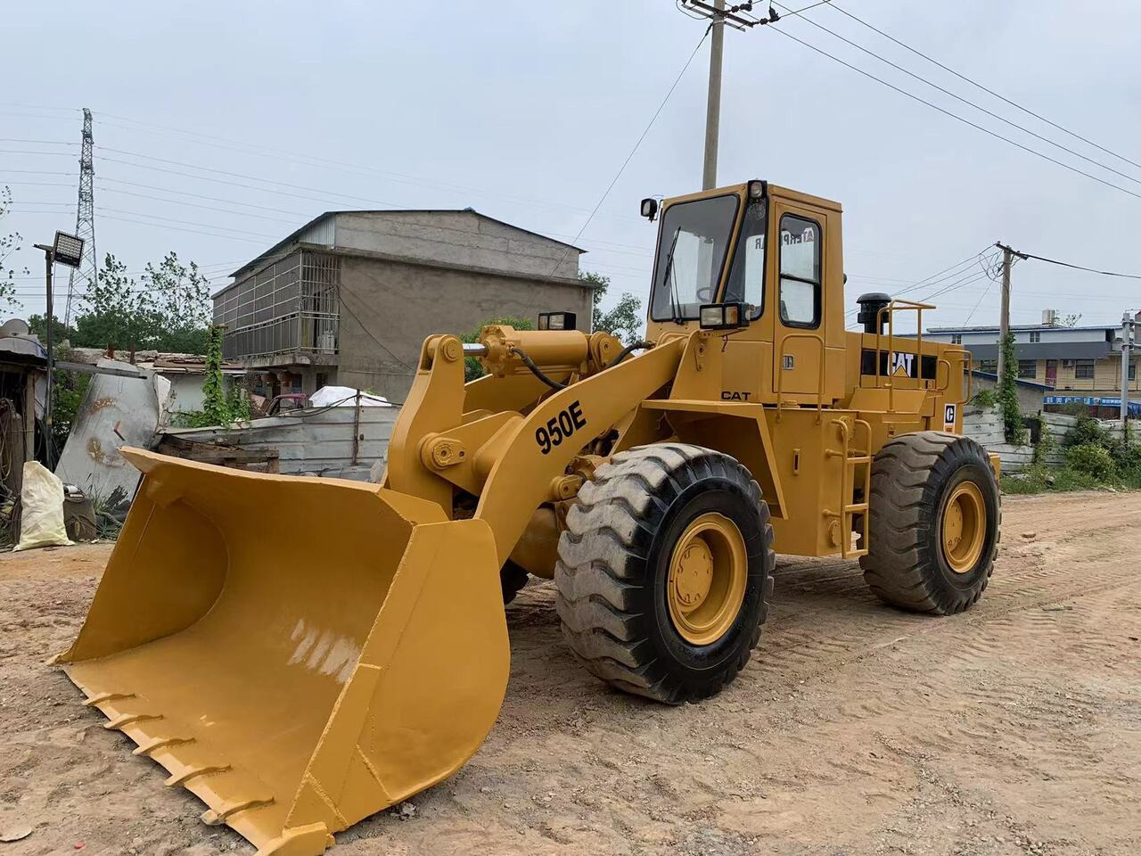 CATERPILLAR 950E - اللودر بعجل: صور 1 CATERPILLAR 950E - اللودر بعجل: صور 1