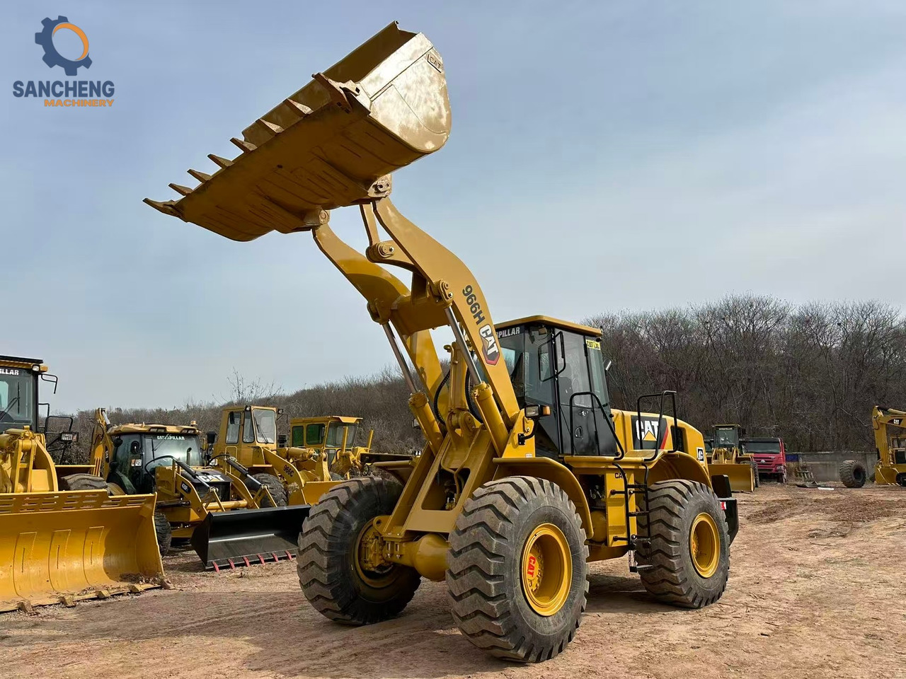 لودر CATERPILLAR 966H: صور 8