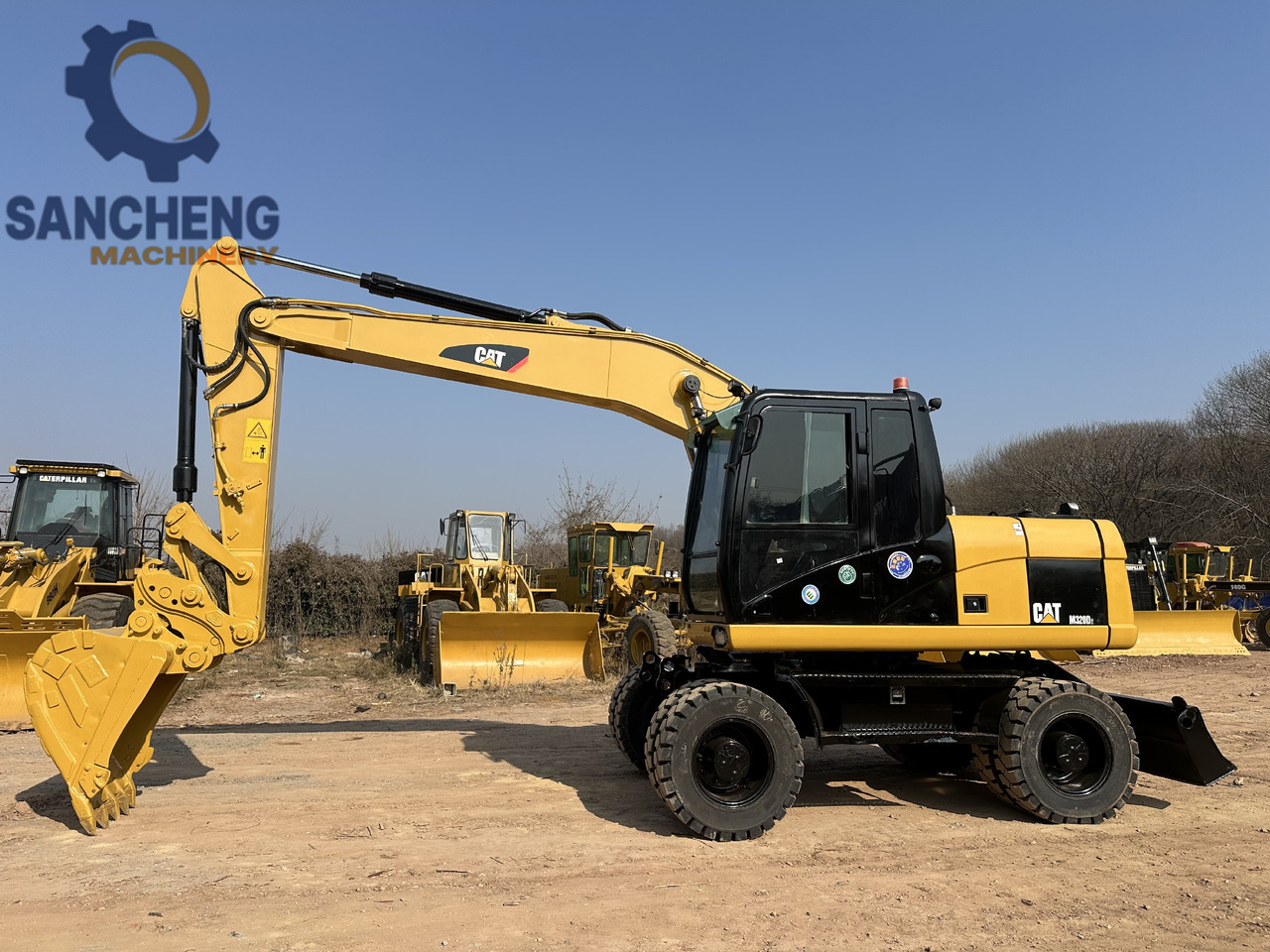 CATERPILLAR M320D2 - حفارة على عجلات: صور 1 CATERPILLAR M320D2 - حفارة على عجلات: صور 1