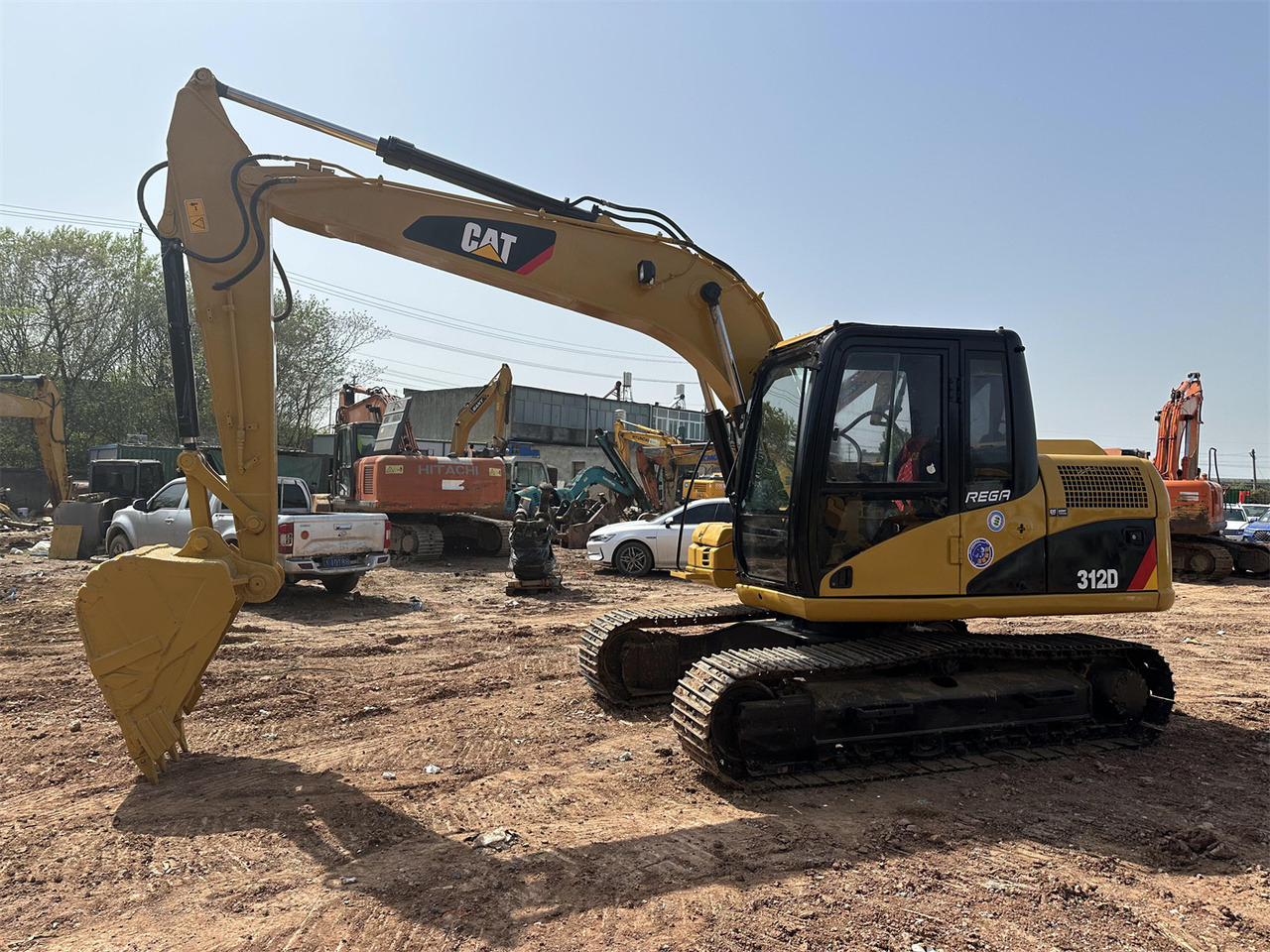 Caterpillar 312D - حفارة مصغرة: صور 1 Caterpillar 312D - حفارة مصغرة: صور 1