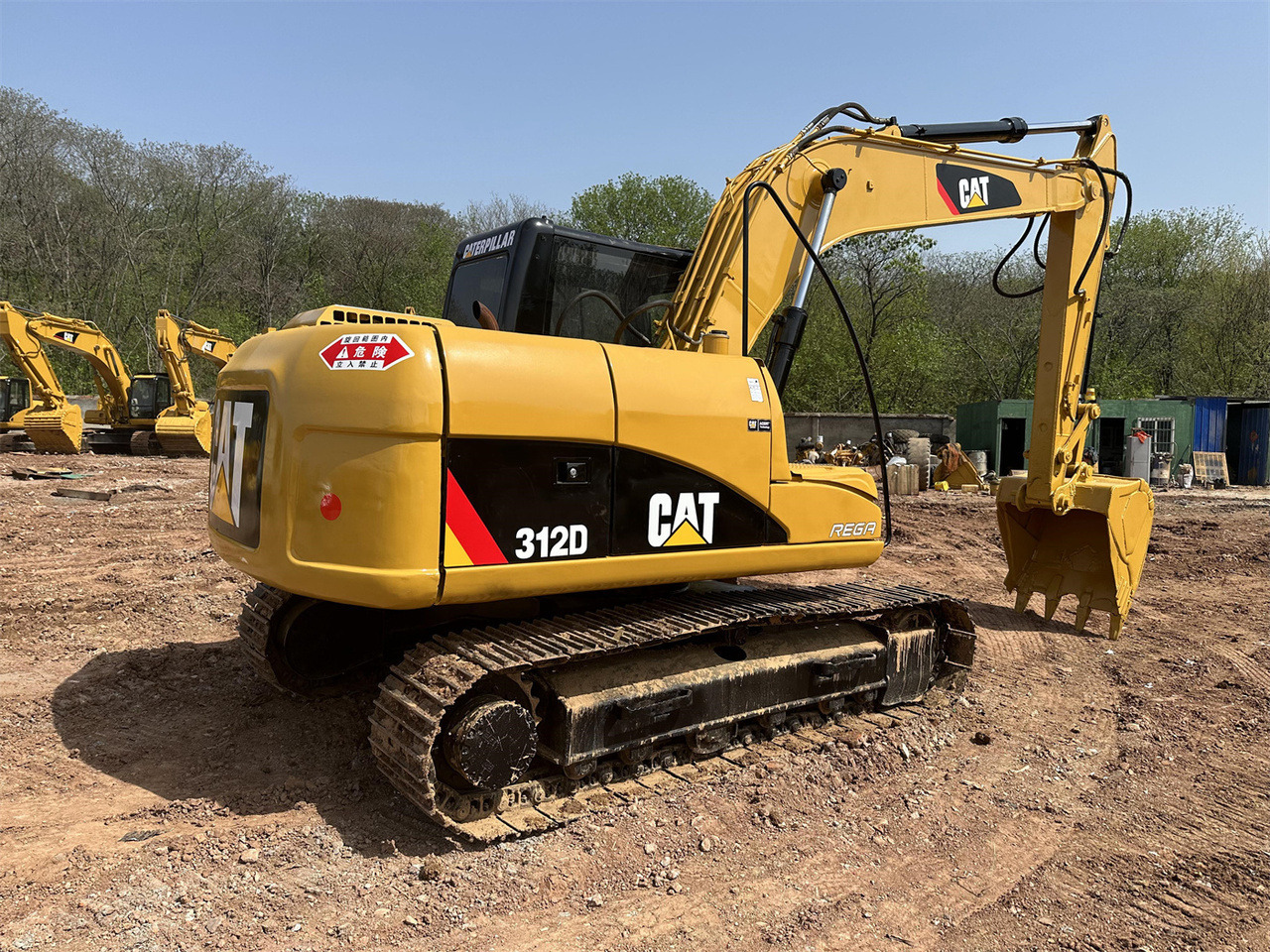 Caterpillar 312D - حفارة مصغرة: صور 1 Caterpillar 312D - حفارة مصغرة: صور 1