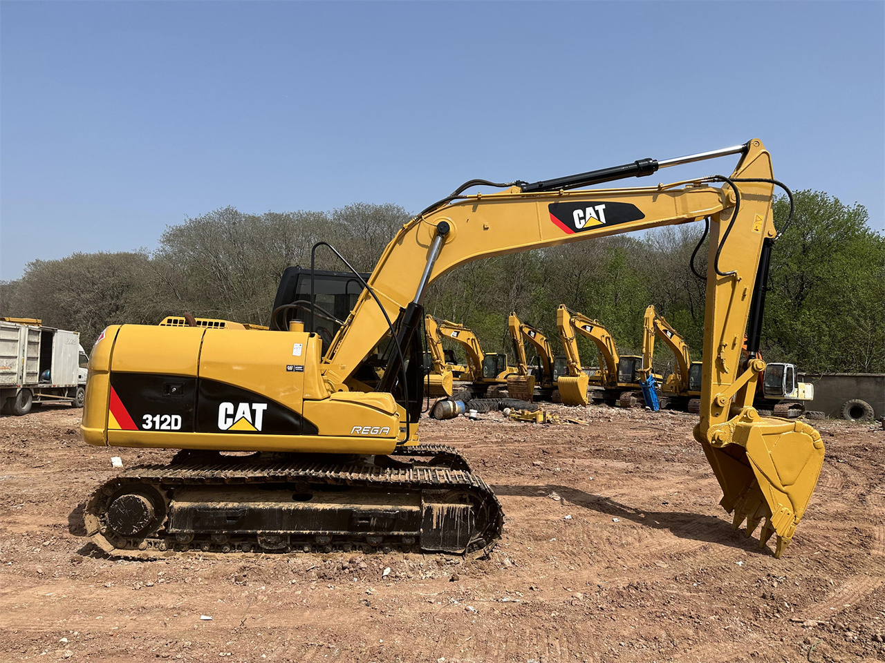 Caterpillar 312D - حفارة مصغرة: صور 1 Caterpillar 312D - حفارة مصغرة: صور 1