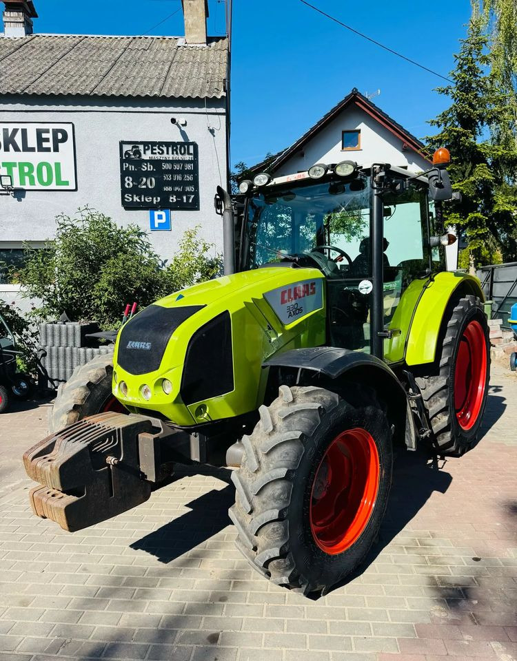 جرار Claas Axos 330: صور 7