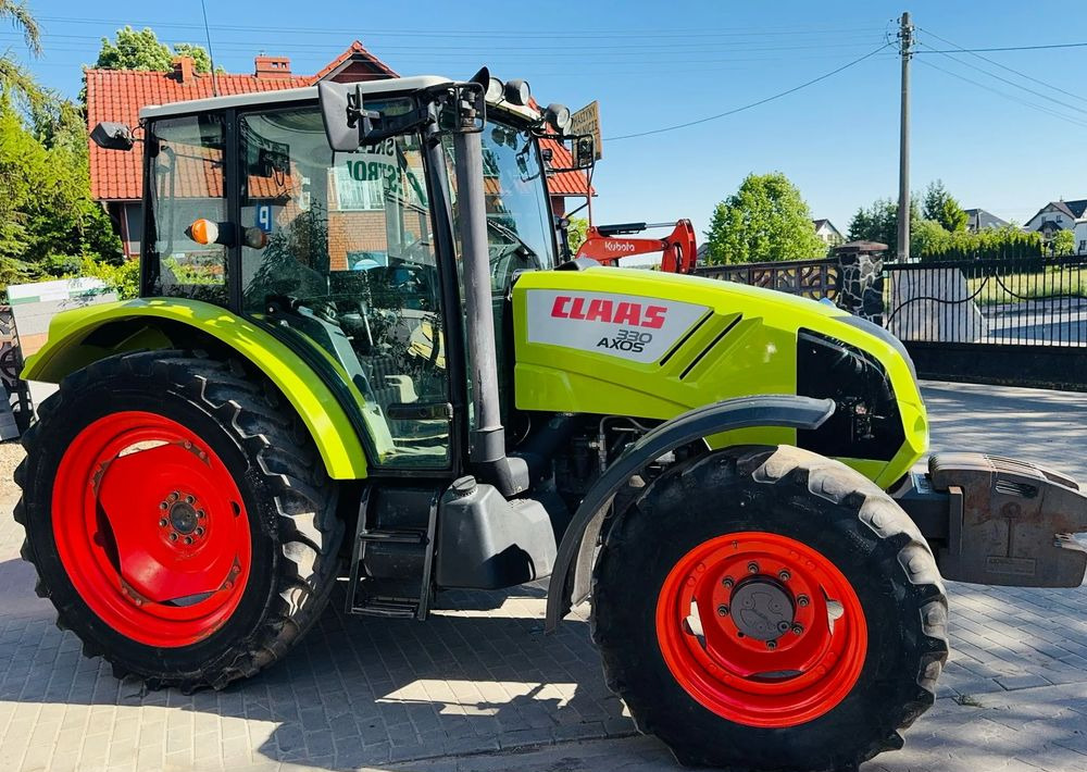 Claas Axos 330 - جرار: صور 1 Claas Axos 330 - جرار: صور 1