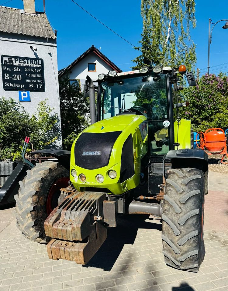 جرار Claas Axos 330: صور 6