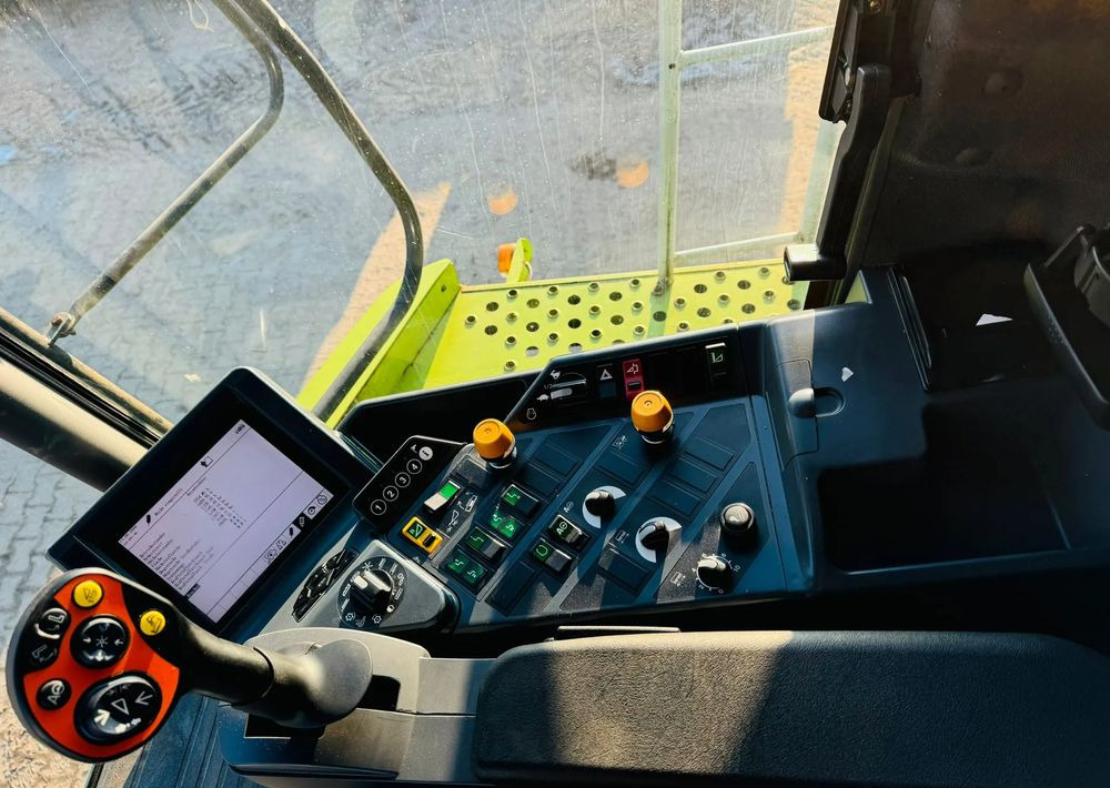 حصادة شاملة Claas Lexion 570C: صور 14