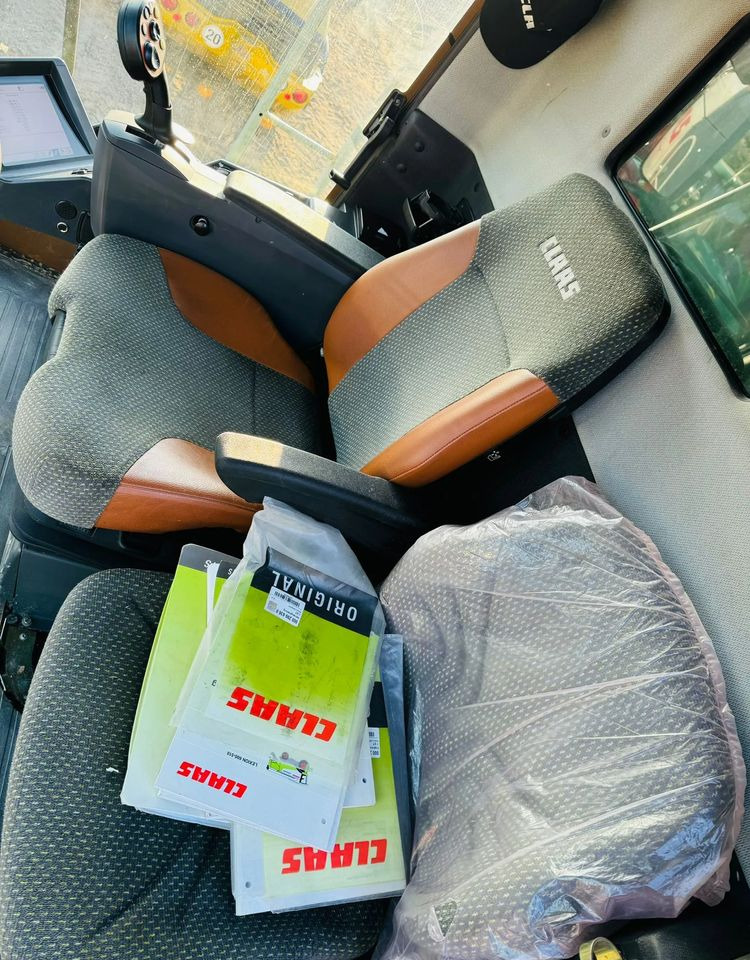 حصادة شاملة Claas Lexion 570C: صور 15