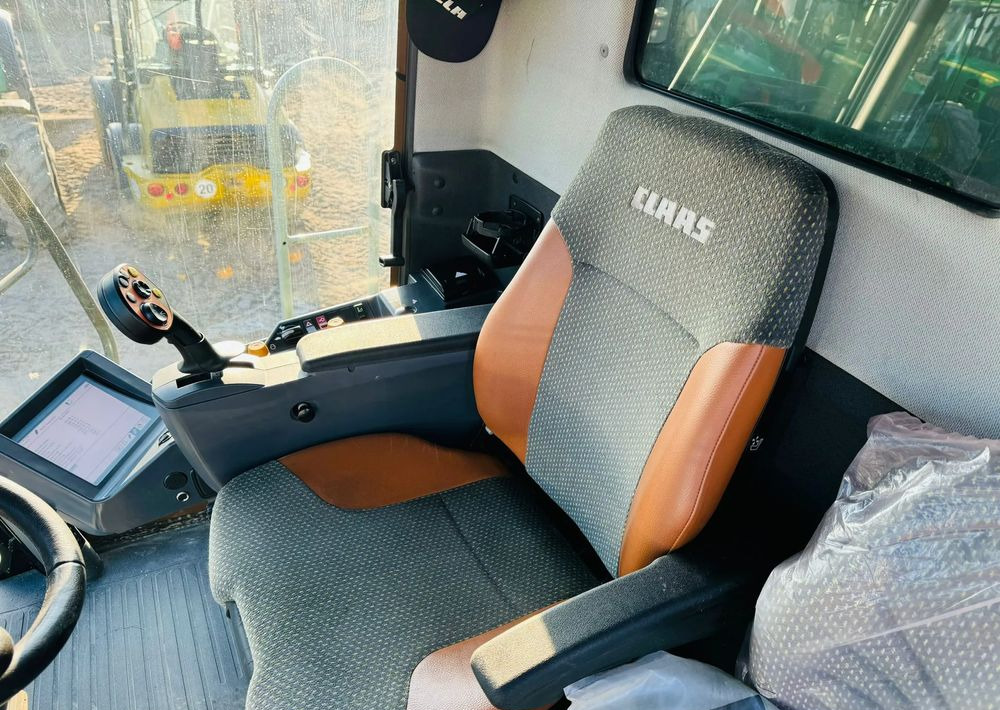 حصادة شاملة Claas Lexion 570C: صور 12