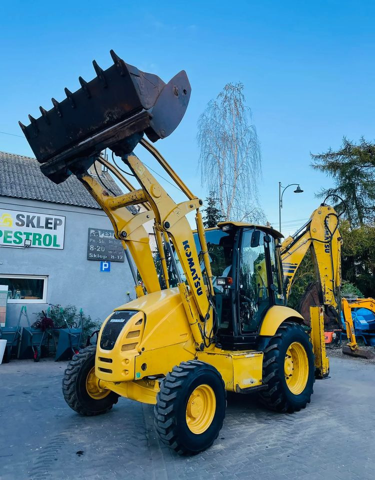 Komatsu WB93R - حفار متعدد الاستخدام: صور 1 Komatsu WB93R - حفار متعدد الاستخدام: صور 1