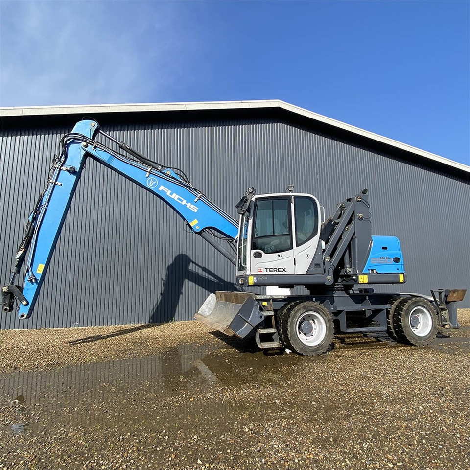 Fuchs MHL 250 - حفارة النقل والشحن: صور 1 Fuchs MHL 250 - حفارة النقل والشحن: صور 1